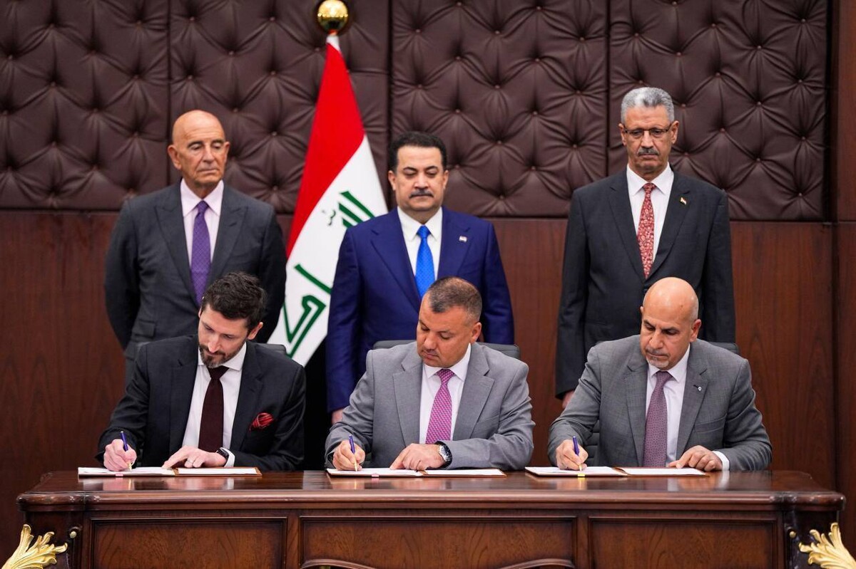 Iraqi PM Witnesses Signing of Two Agreements