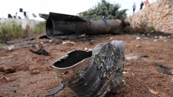 Woman killed in Iraq in arms depot shelling